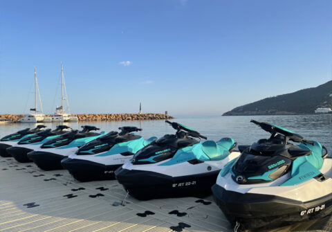 Sea-Doo jet ski fleet on the floating platform at jetski.club Ibiza in Marina Santa Eulalia.