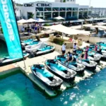 Sea-Doo jet skis and customers preparing for a guided jet ski tour at jetski.club platform in Marina Santa Eulalia Ibiza near CBbC beach club