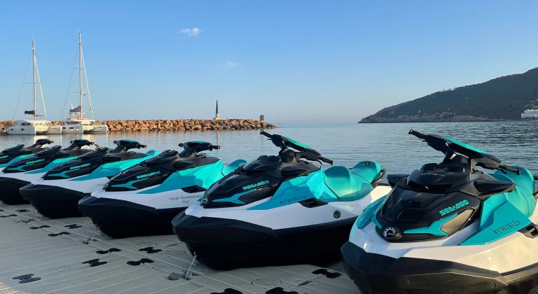 sea-doo-fleet-jetskiclub-santa-eulalia-ibiza Sea-Doo jet ski fleet at jetski.club platform in Marina Santa Eulalia Ibiza ready for guided jet ski tours