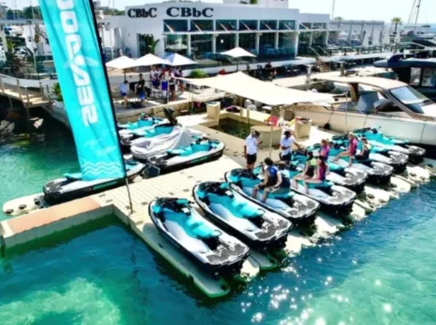 Aerial view of jetski.club floating platform in Marina Santa Eulalia with turquoise water in Ibiza