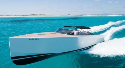 Luxury yacht charter in Ibiza cruising along the coastline