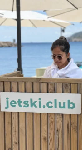 Hostess at jetski.club reception desk in Marina Santa Eulalia Ibiza