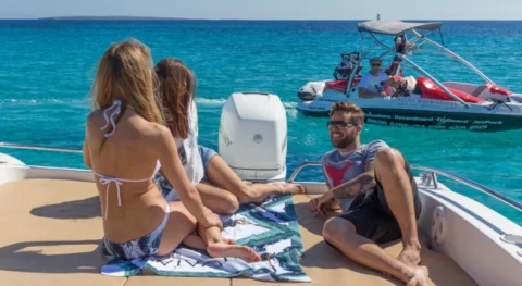 Lindsay McQueen aboard a SEA-DOO jet boat from Yacht Watersports Ibiza while assisting yacht guests before a watersports session in Ibiza.
