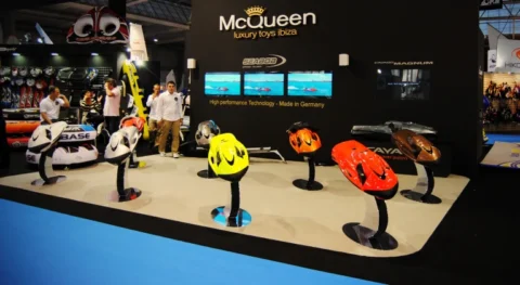 McQueen Luxury Toys Ibiza exhibition stand at the Barcelona International Boat Show showcasing premium watersports and luxury marine products.